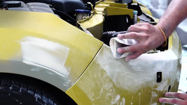 4K Garage Car body work car auto car repair car paint after the accident during the spraying automotive