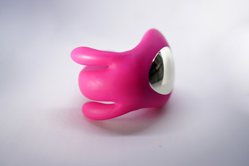 bright sex toys on white background in the studio