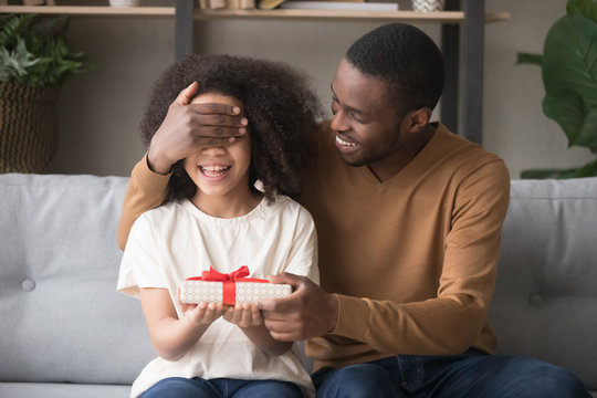 Loving Father Cover Eyes With Hand Prepare For Daughter Gift