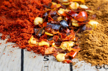 Mixed spices on wooden board