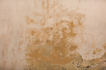 Urban grunge background of old beige wall. Texture