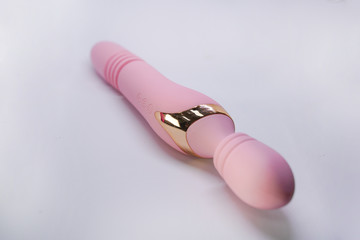 Bright sex toys on white background in the studio isolated