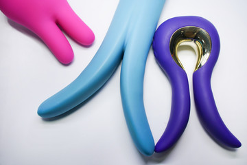 Bright sex toys on white background in the studio isolated 