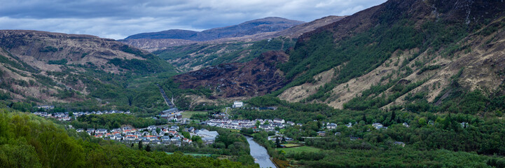 Fototapeta na wymiar a panoramic view of the village of kinlochleven on the west highland way long distance hiking trail in the argyll region of scotland near fort william in spring