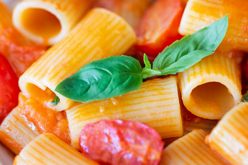 Simple italian pasta with cherry tomatoes and basil.