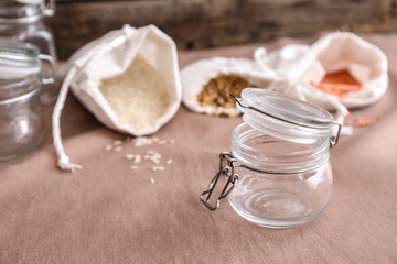 Glass jar on kitchen table. Zero waste concept