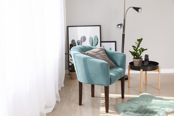 Light curtains with stylish furniture in interior of room