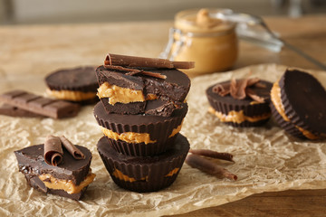 Tasty chocolate peanut butter cups on parchment