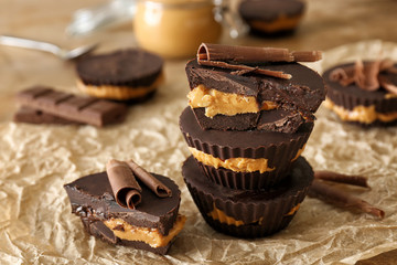Tasty chocolate peanut butter cups on parchment