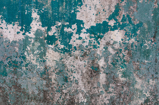 Vintage wall texture. Grunge background with blue white speckled paint