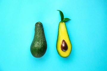 Fresh avocado on color background