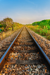 Fototapeta na wymiar Railroad and railway train transportation with color of sky sunlight