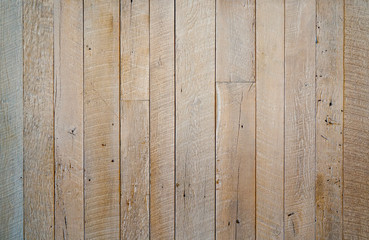 Light bleached reclaimed wood background with aged boards. Wooden planks with grain and texture.