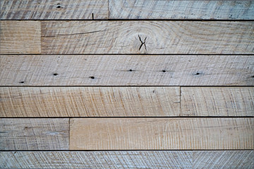 Gray faded reclaimed vintage wood aged boards. Wooden planks with grain and texture.