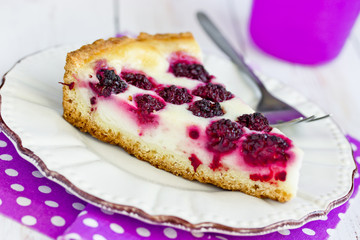 Blackberry sour cream pie - homemade tart summer pie with ripe blackberries berry and sour cream sweet filling on crispy thin dough