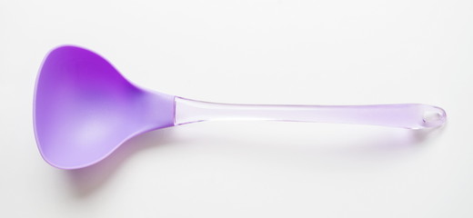 Purple spoon on white,Kitchen utensil
