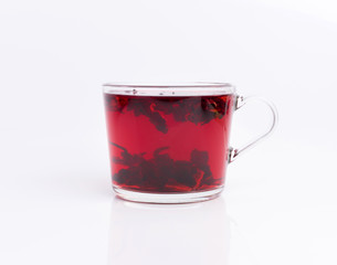 hibiscus tea in the glass cup isolated on white background