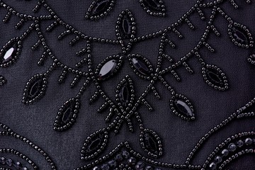 Fabric with sequins and sequins of bright colors. Fashion glitter fabric, sequins. Shiny surface