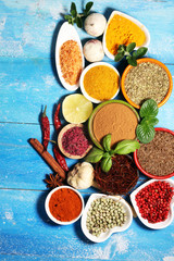 Spices and herbs variation on table. Food and cuisine ingredients.