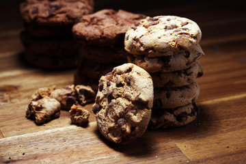 Chocolate cookies on wooden table. Chocolate chip cookies