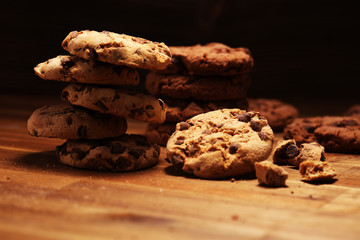 Chocolate cookies on wooden table. Chocolate chip cookies