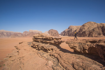 A beautiful day in the Jordanian desert of Wadi Rum. wide dessert with an amazing mountains and sand dunes , amazing scenery that you should see ! 