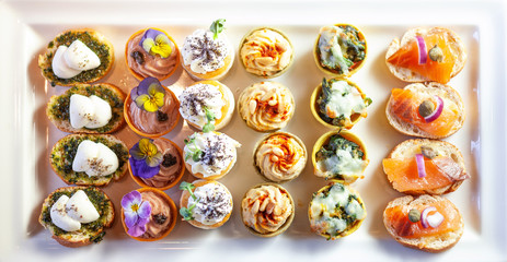 Beautifuly designed appetizer plate close-up top view