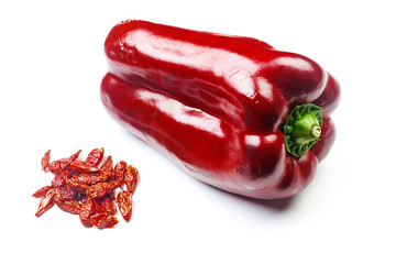 RED PEPPER WITH SPICY CREWS ON A WHITE BACKGROUND