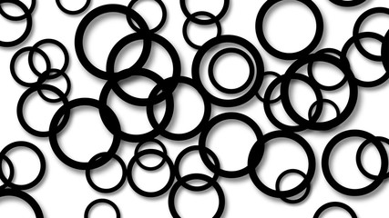 Abstract illustration of randomly arranged black rings with soft shadows on white background