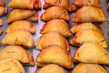 Traditional empanadillas pasty in small bar in Madrid, capital city of Spain
