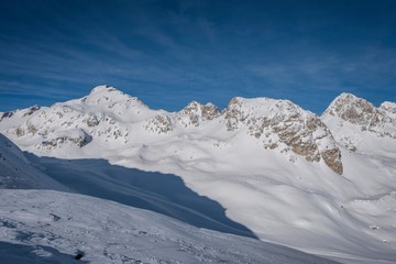 Fototapeta na wymiar Winter landscape in St. Moritz (German: Sankt Moritz; Italian: San Maurizio), a resort town in the Engadine valley in Switzerland