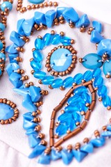 Fabric with sequins and sequins of bright colors. Fashion glitter fabric, sequins. Shiny surface