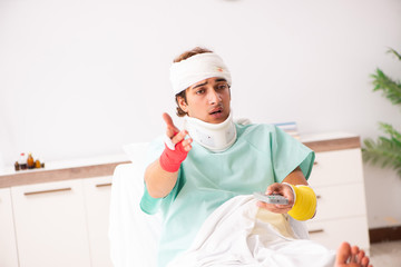 Young injured man staying in the hospital 