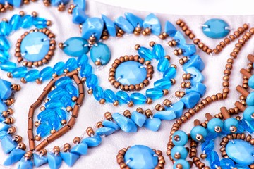 Fabric with sequins and sequins of bright colors. Fashion glitter fabric, sequins. Shiny surface