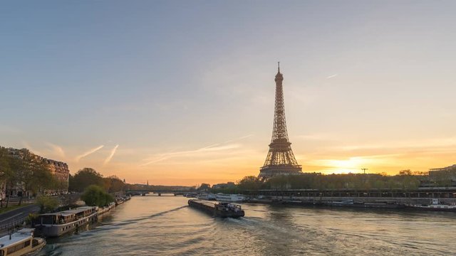 Paris France time lapse 4K, city skyline sunrise timelapse at Eiffel Tower and Seine River