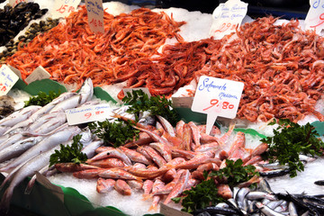 Fresh fish and seafood display for sale in the local fish market stall