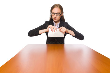Female employee sitting at long table isolated on white 