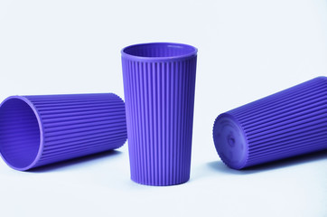 Blue empty plastic cup isolated on white background