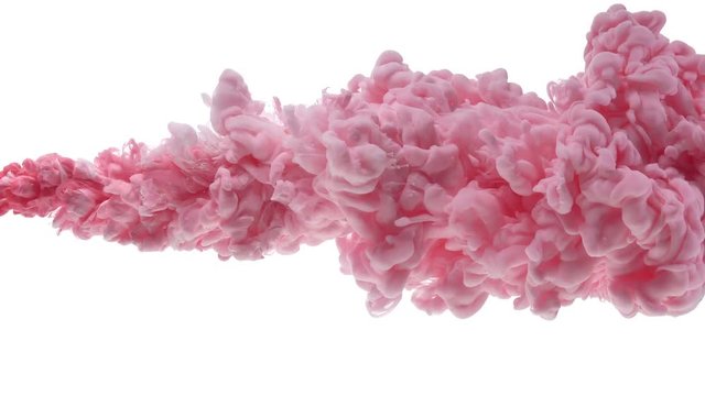 Pink ink dropped in water on white background