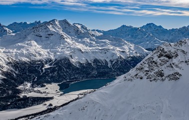 panorama of Sankt Moritz (Saint Moritz, San Maurizio) town and lake in Engadine, Swiss Alps, during winter