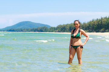 Woman and bikini sexy with daylight on beach
