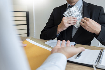 bribe and corruption concept, Corrupted businessman sealing the deal hand receiving venality bribe...