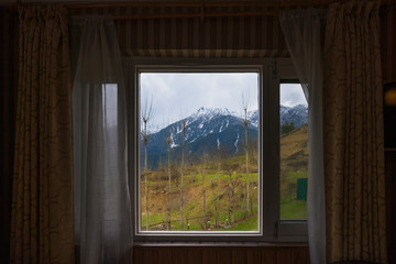 Beautiful mountain views the village of Laripora Pahalgam,  from the room at Jammu and Kashmir state India
