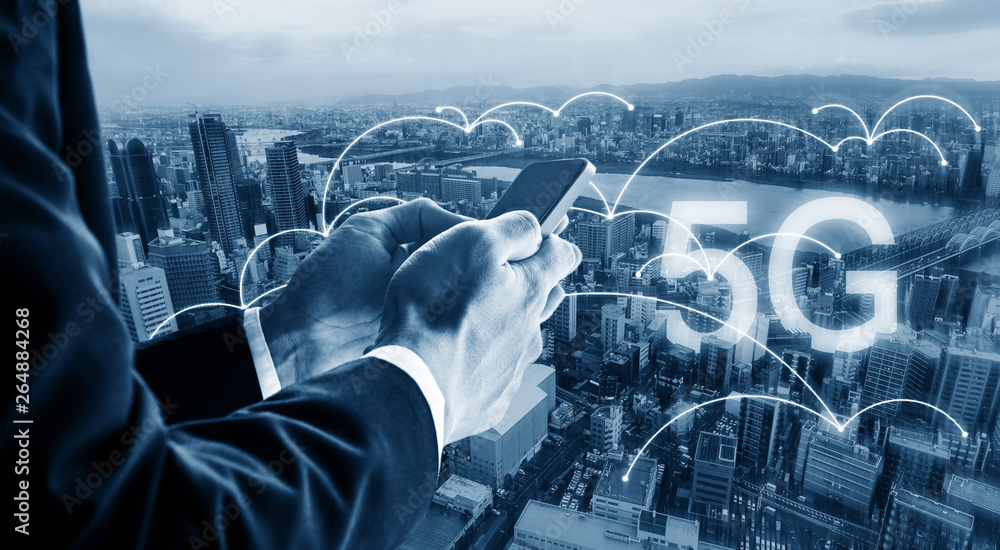Aufkleber internet networking and wireless technology. businessman using mobile smart phone in the city, and 5