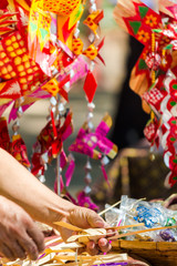 Make Thai style palm leaf carp fish mobile handicraft activities in Songkran festival.
