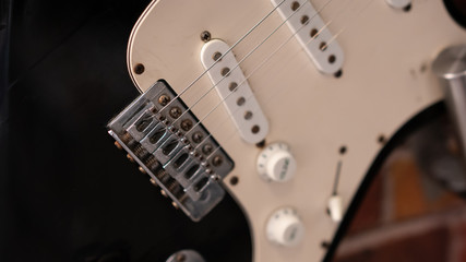 Fototapeta na wymiar Electric Guitar On Brick Wall