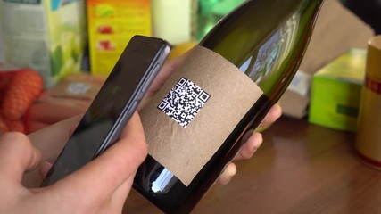 QR code on wine label with vintage specific information. Quick response code scanner online mobile app