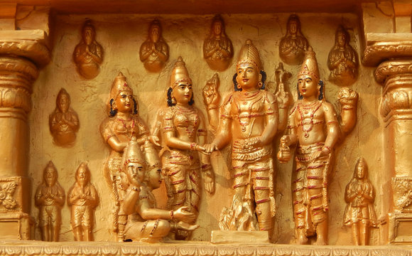 statues of Indian Hindu god and goddess Rama and Sita marriage in temple 