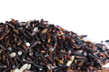 Brown rice, riceberry organic food  in white bowl Isolated and white background