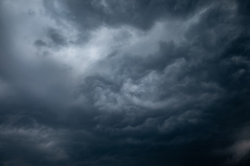 Obraz premium Light in the Dark and Dramatic Storm Clouds background